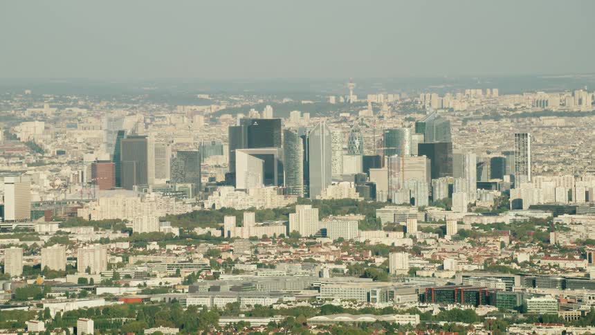 Tall city buildings tower into the sky