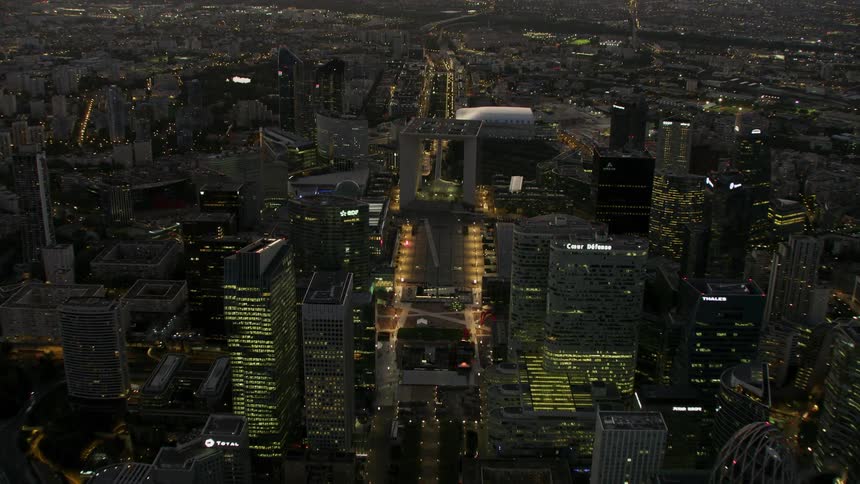 Downtown buildings in the business district of Paris at night