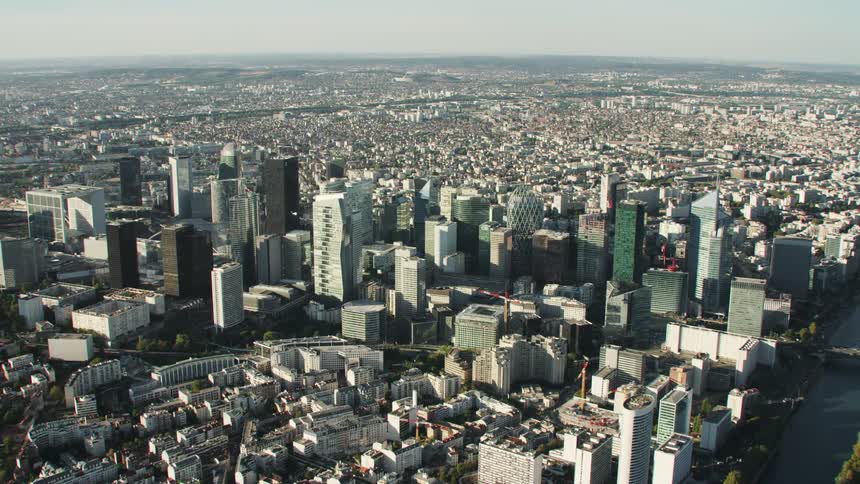 Tall city buildings tower into the sky
