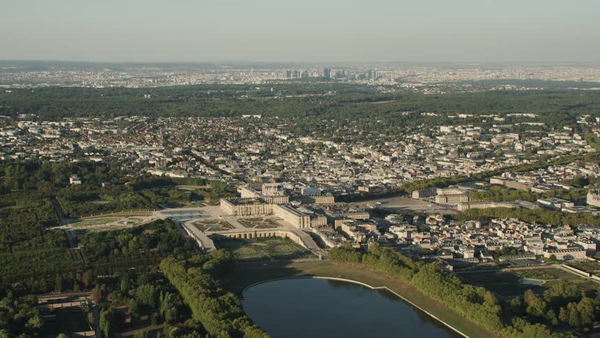 City buildings surround a lake