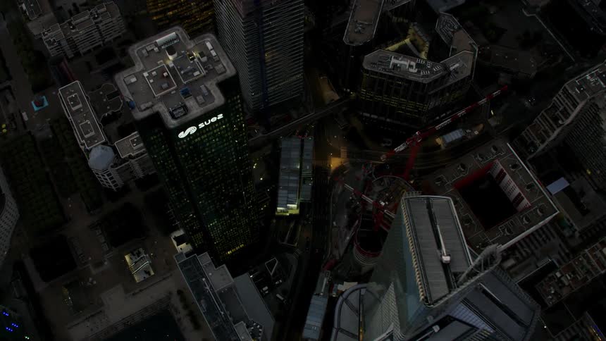 Dusk over tall buildings in a city