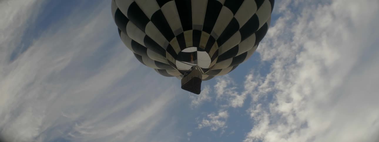 Hot air balloon ascends into the sky