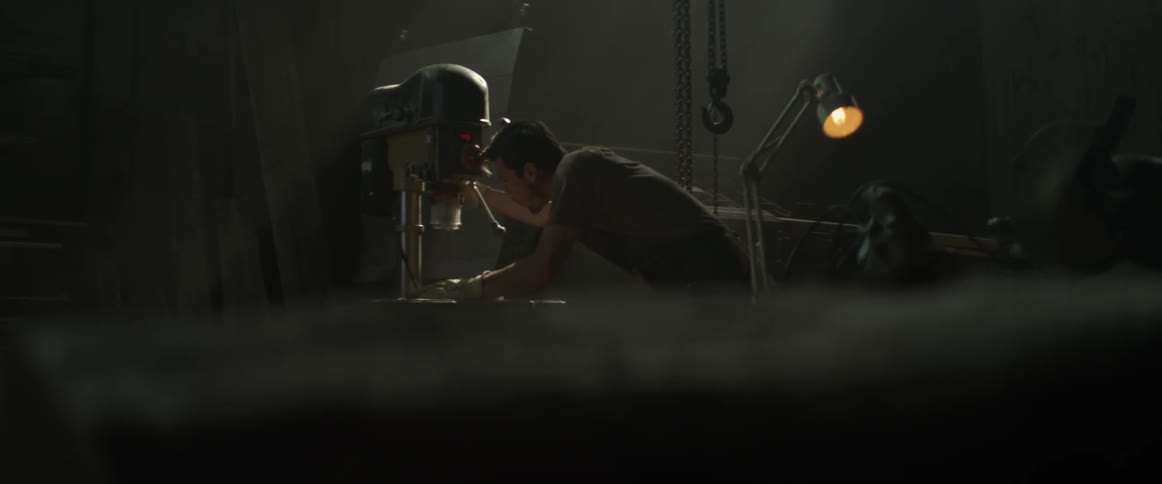A man is working on a machine