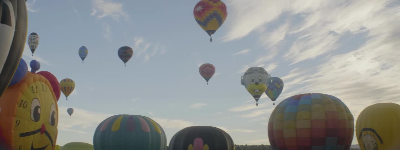 Hot air balloons float in the sky