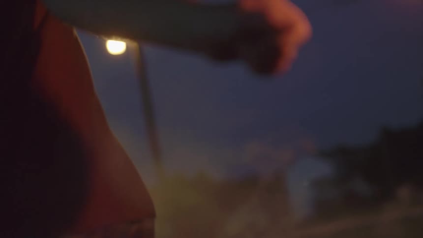 A person holding a sparkler