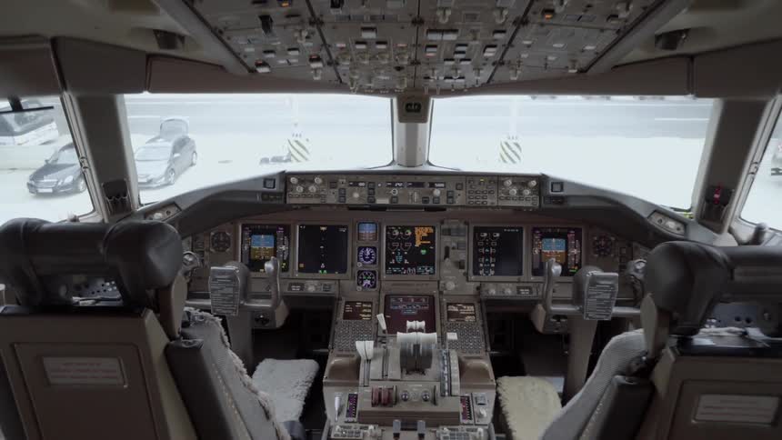 Lights are on in a planes cockpit