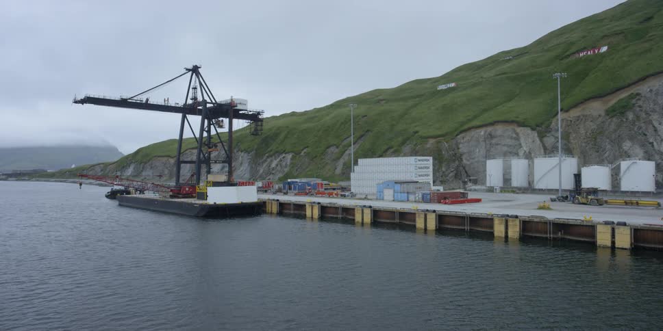 A dock at the base of a mountain