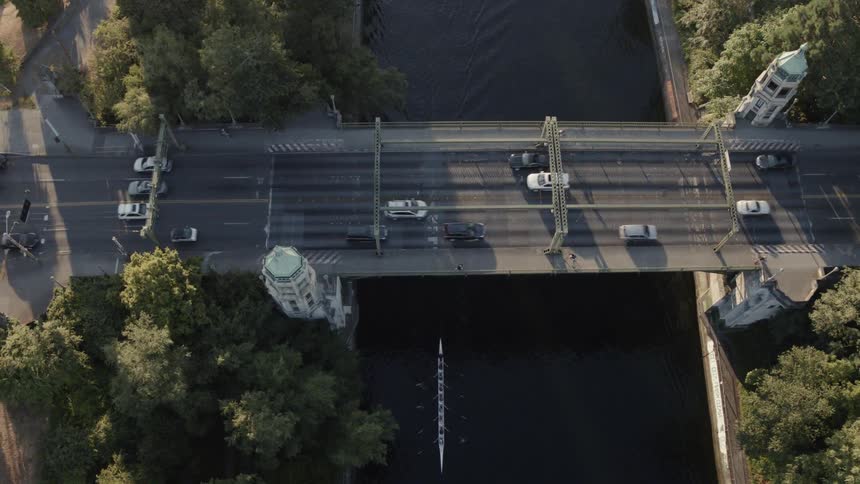 Traverse of the Montlake Bridge as a crew team rows underneath