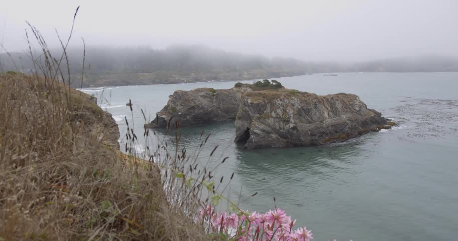 Ocean water flows around rocky islands