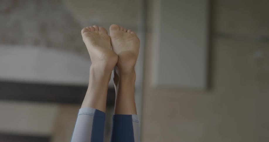 Woman does a yoga headstand
