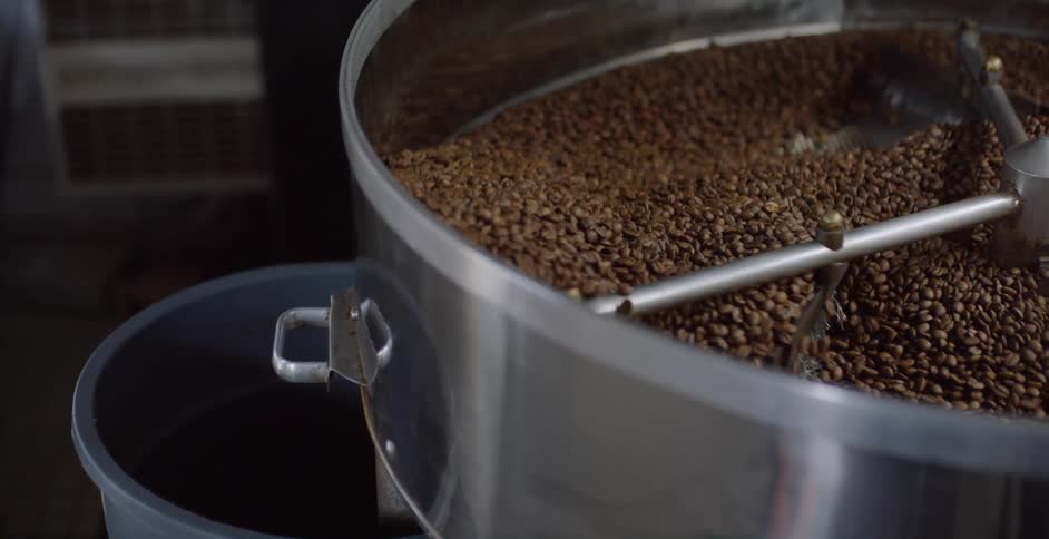 Coffee beans spin in a roaster