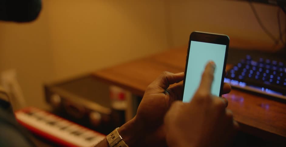 Someone is holding their phone and clicking the screen