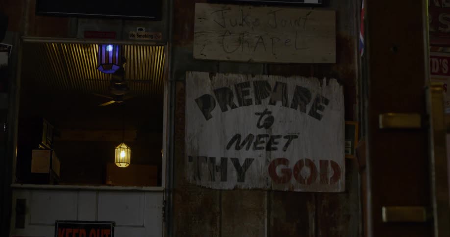 The shop has a large sign on the front