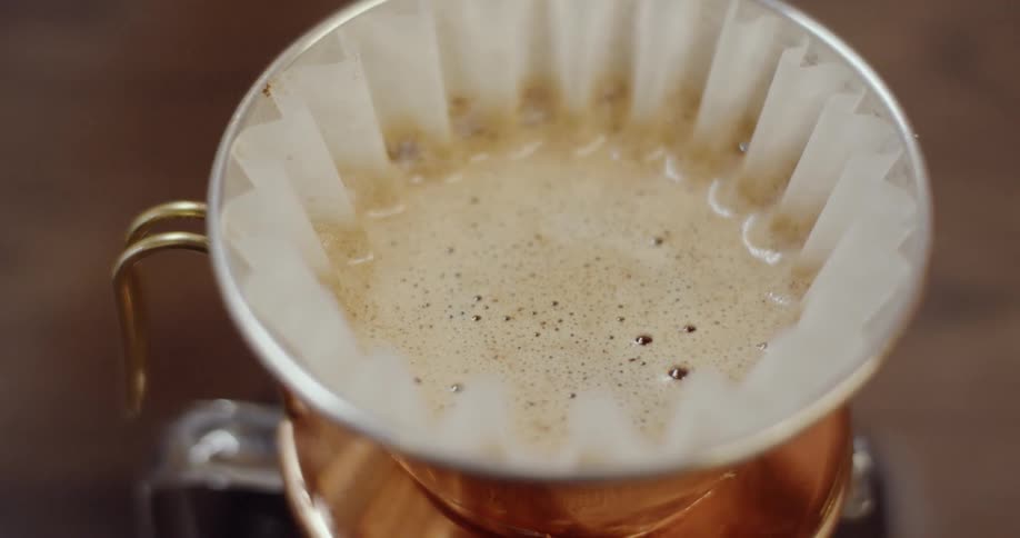 Frothy coffee in a filter
