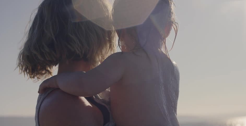Mother holds her child in her arms