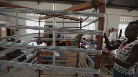 Employees work in a factory