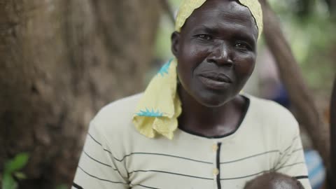 Woman standing outside smiling