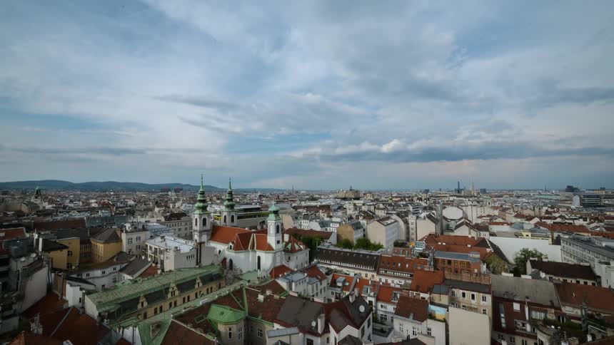 Timelapse of clouds above a city