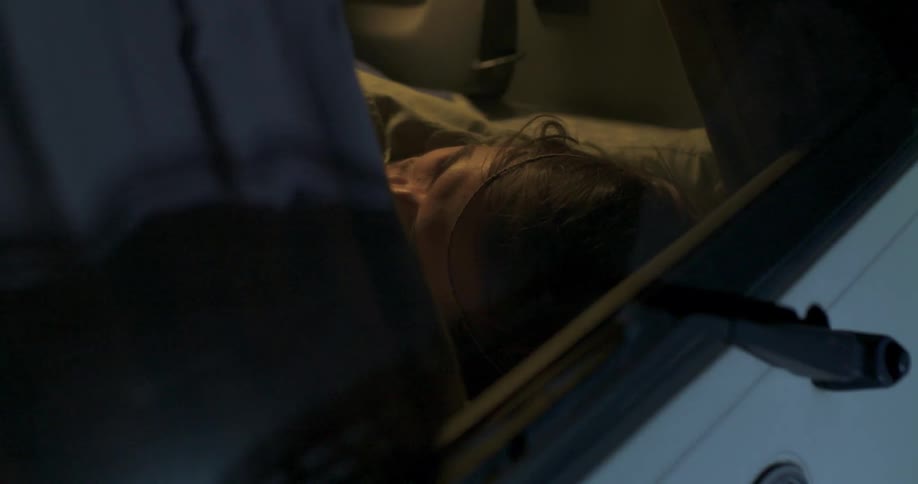 Man sleeps in a volkswagen bus