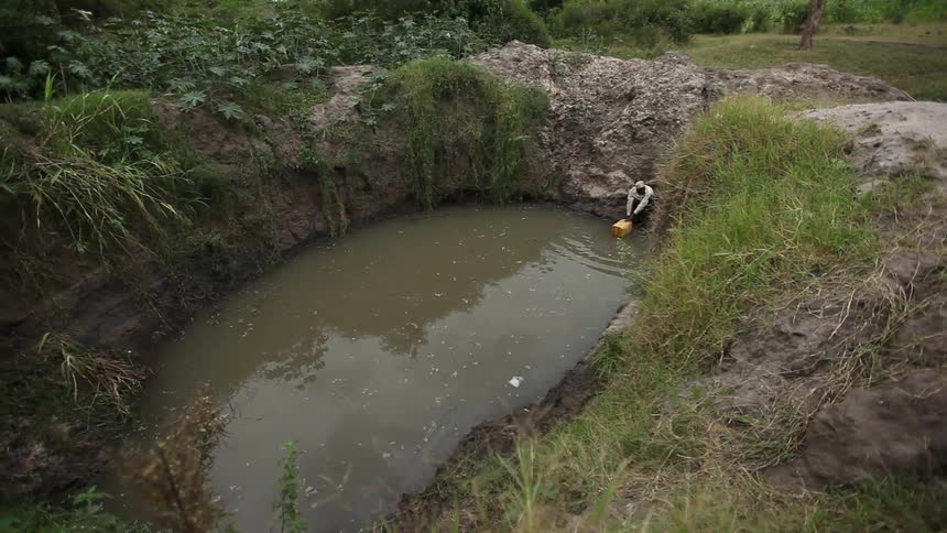 A person collecting water
