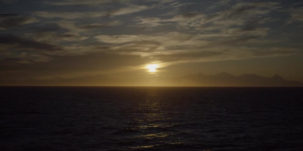The sun shines on the water ahead