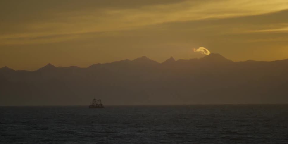 A boat drifts in the water