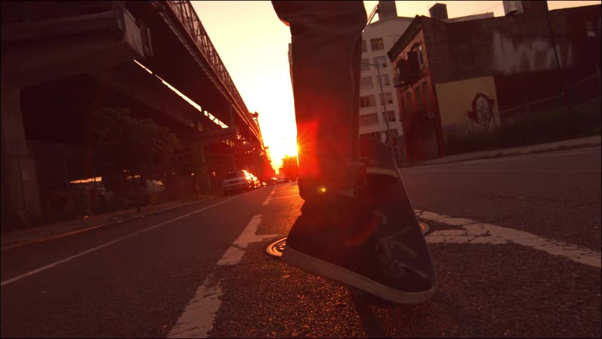 A person skateboarding outdoors