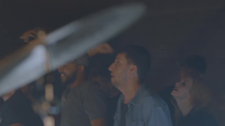The audience dances and bounces at a concert