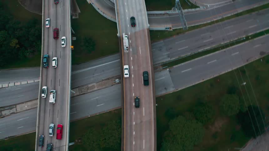 Vehicles travel on highway roads