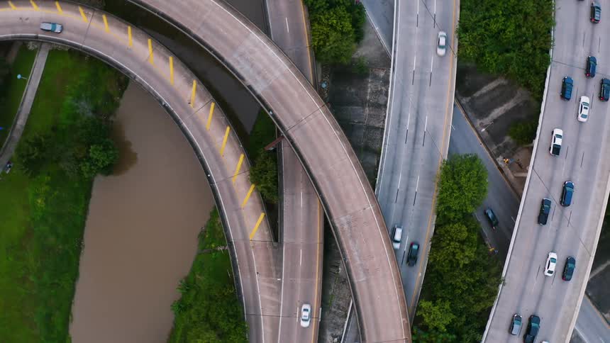 Vehicles travel on highway overpasses