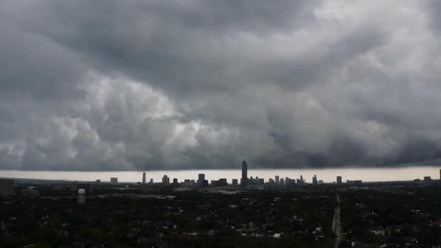 Storm clouds hang above the city