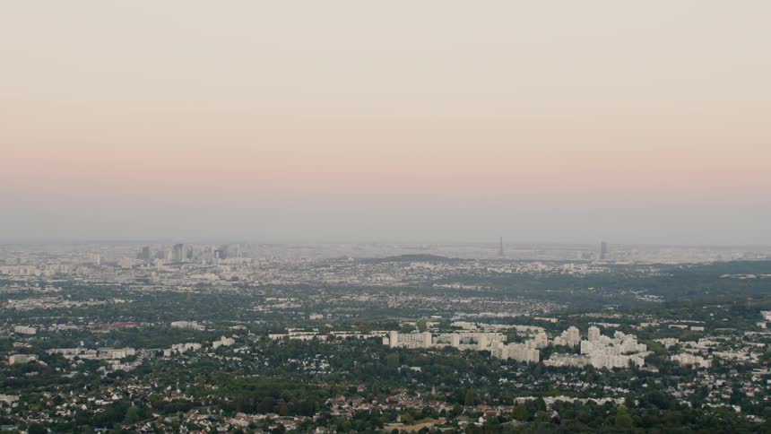 Trees and buildings cover a wide landscape