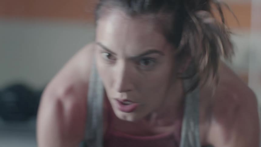 Woman exercising in a gym
