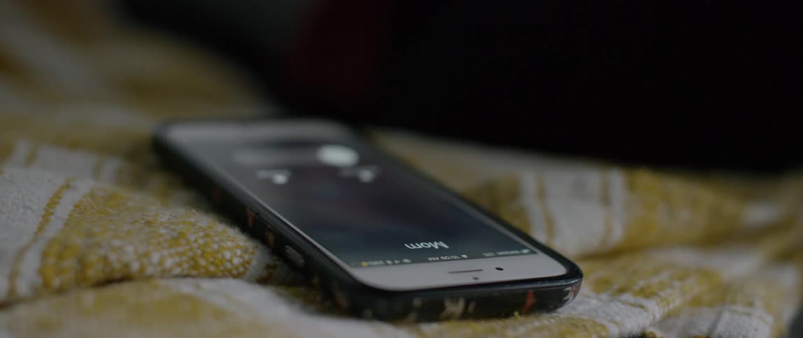 A person picks up an incoming phone call