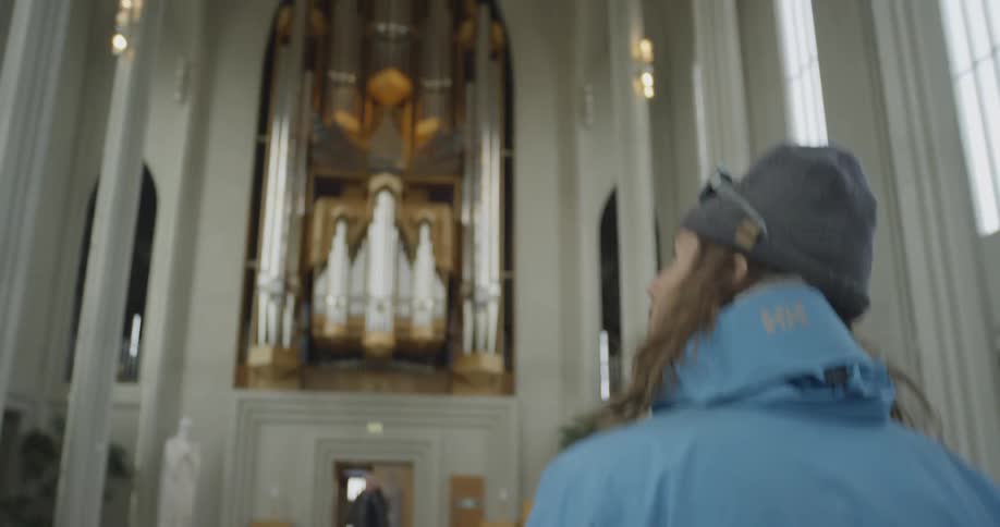A person walks through a church