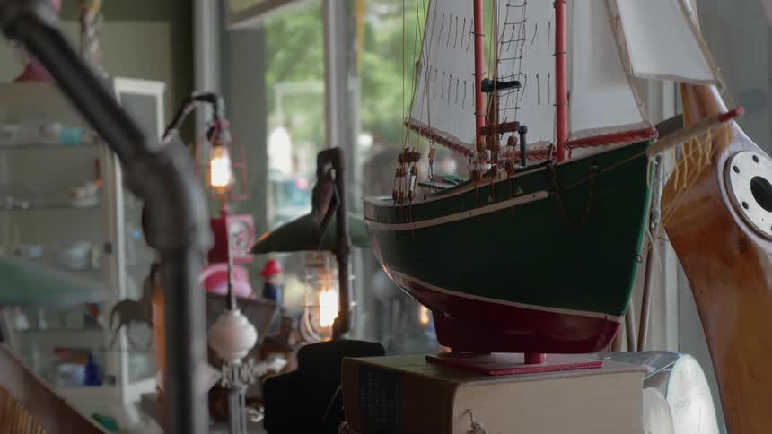 A miniature boat in a shop