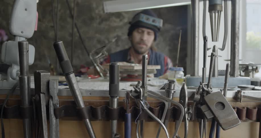 A man is working in a machine shop