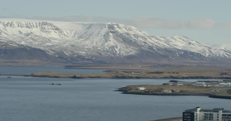 The lake leads to a ice covered mountain