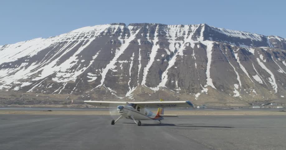 A plane is taxing the runway