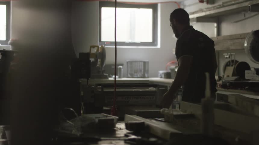 A man busies himself in a workshop