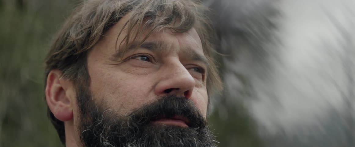 A bearded man outdoors