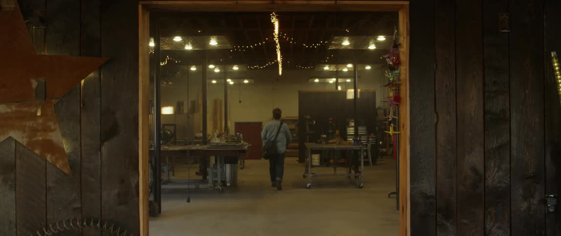 Man walks onto a workshop