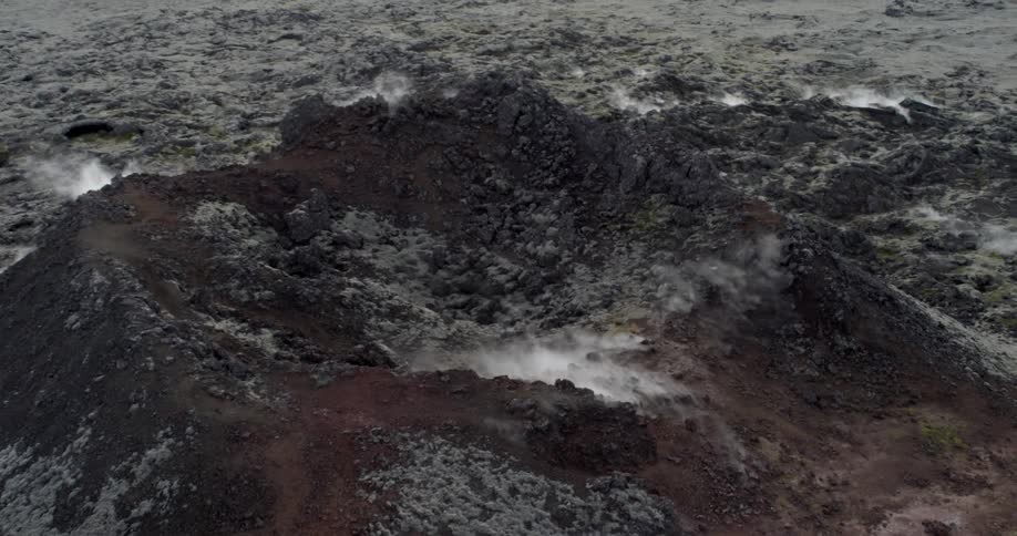 Steam rises from a volcano