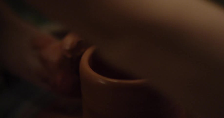 A person is making a vase with pottery clay