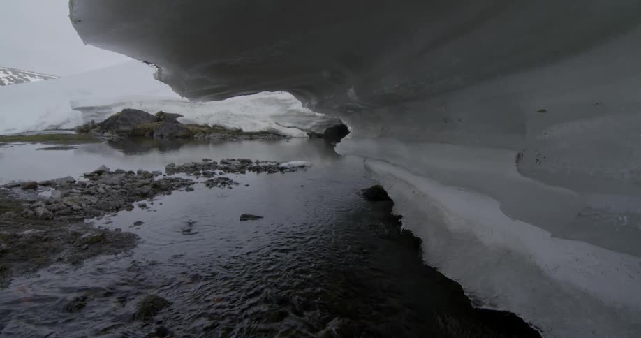 The water is melting off of the iceberg
