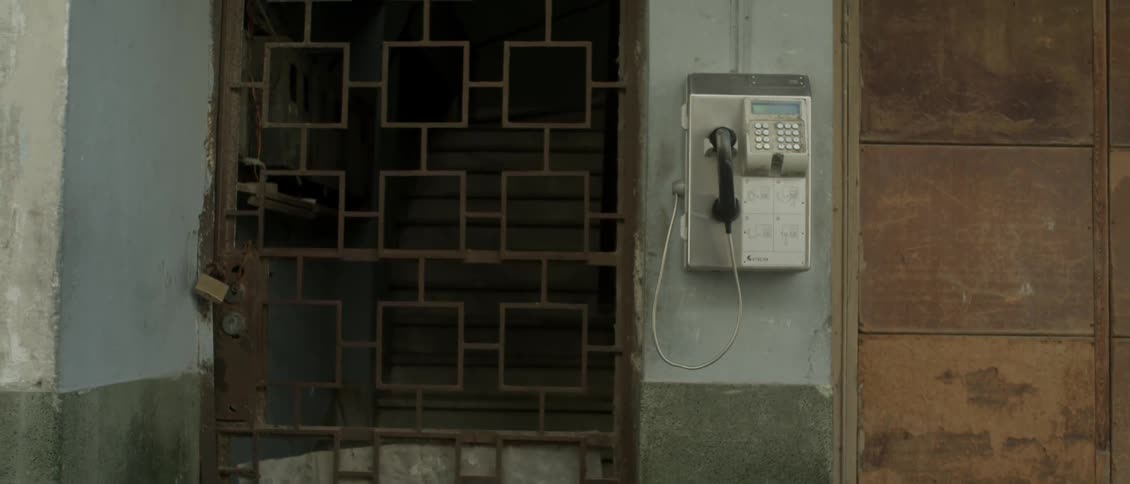 A telephone hangs on a wall