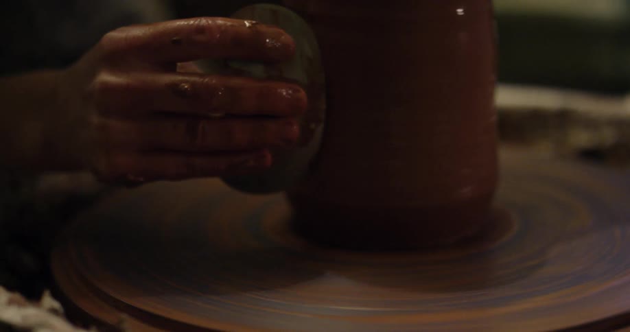 Clay is shaped on a pottery wheel