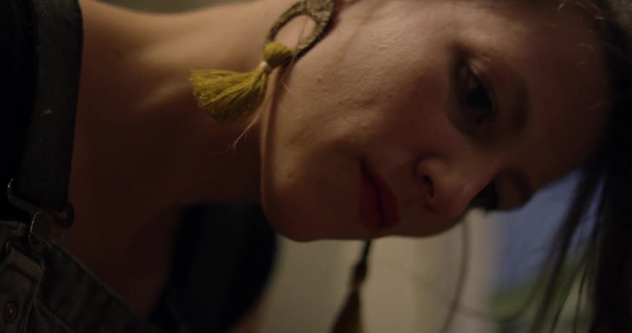 A woman is concentrating on something