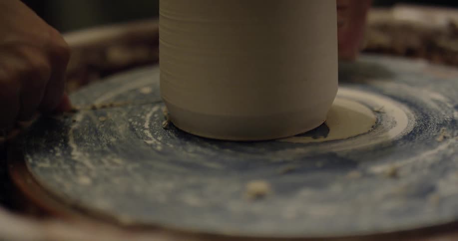 Clay is shaped on a pottery wheel