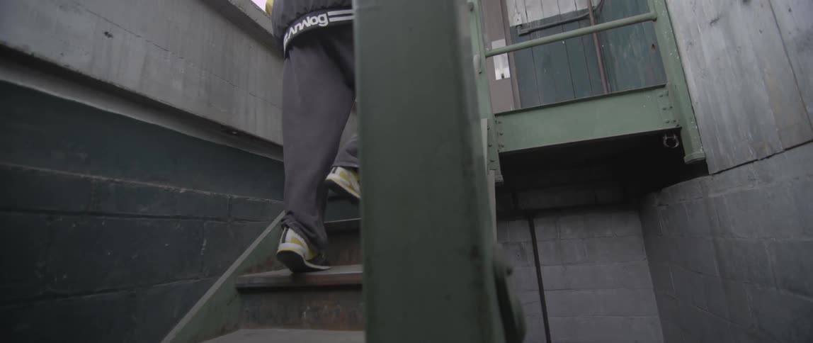A person walking up a flight of stairs